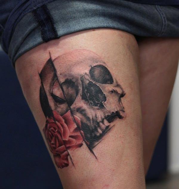 Skull Tattoo on the upper thigh gives the girls an attractive look