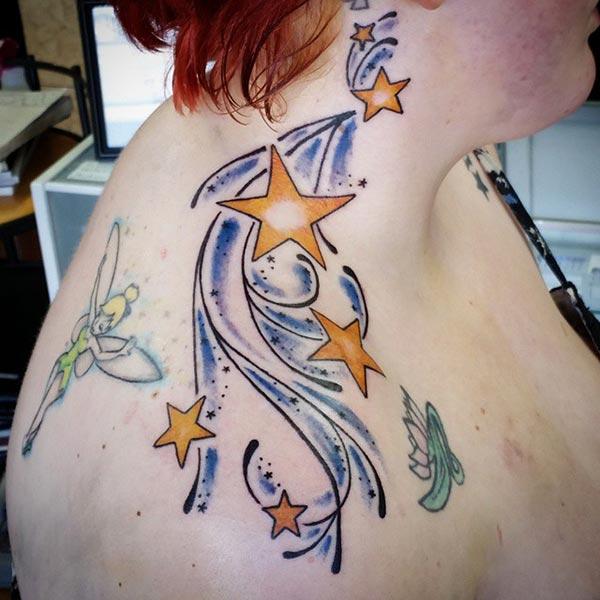 Star Tattoo with an orange ink design brings the captivating look