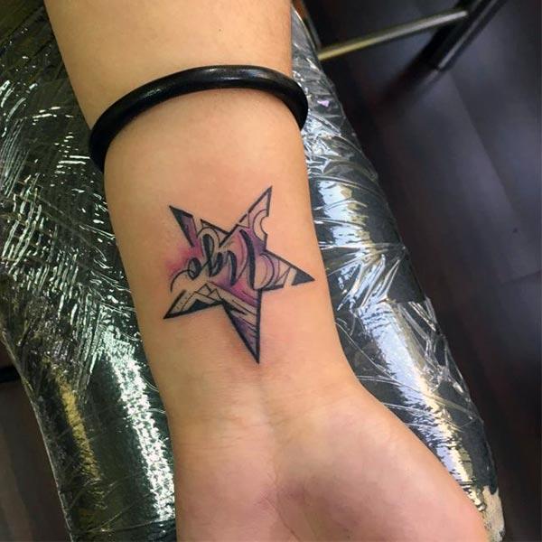 Star Tattoo for Women with a purple ink design; makes them look charming