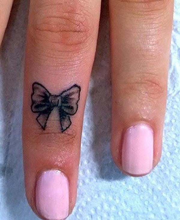 Bow tattoo around your finger brings about the memory or makes it as a reminder