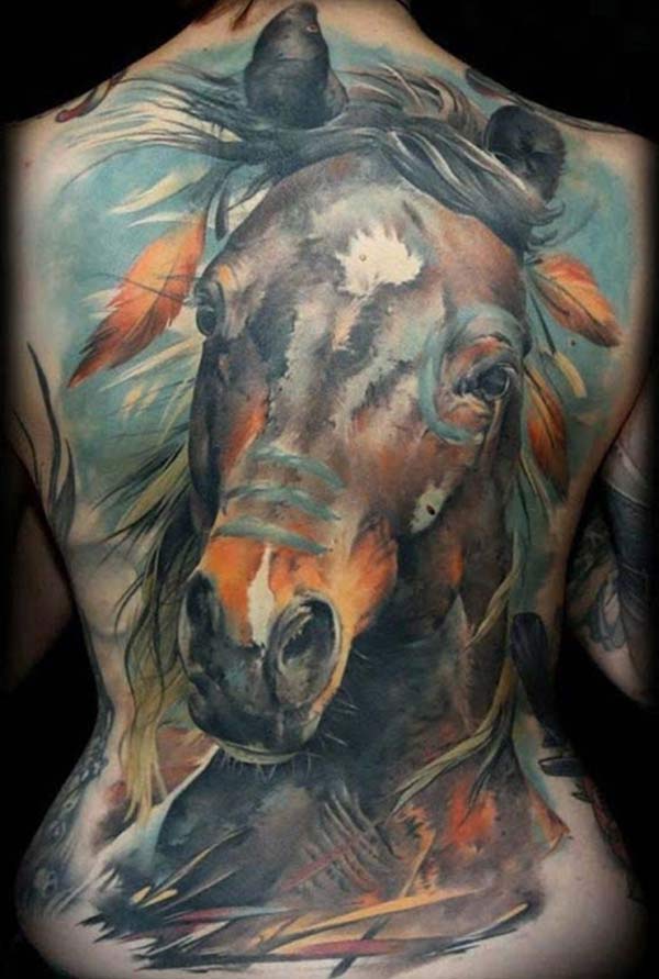 Horse tattoo on the back make a woman look stylish