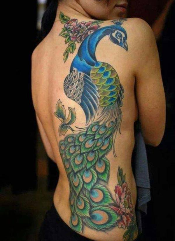 Makes a divine Peacock Tattoo on side to flaunt it