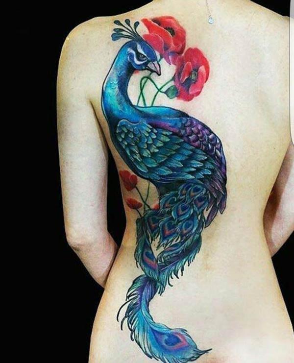Peacock Tattoo on the back make a girl attractive and elegant
