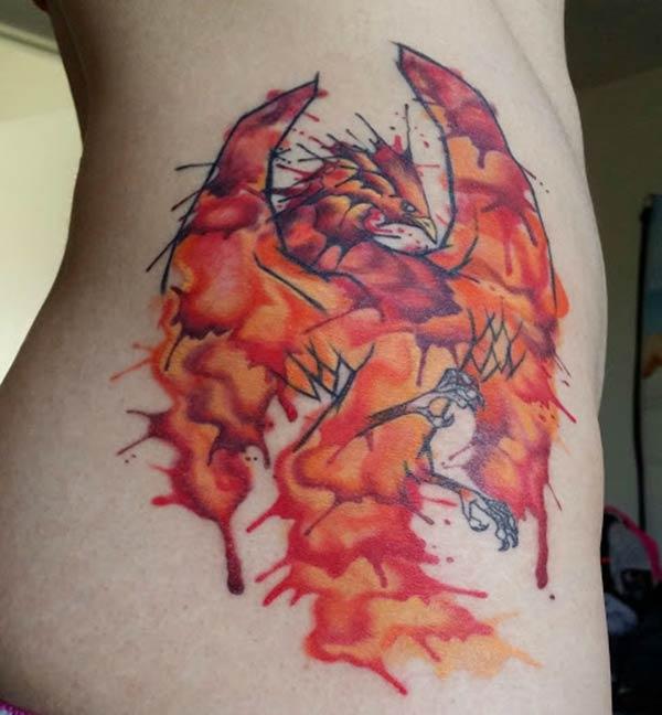 Phoenix tattoo on the side back brings the feminist look