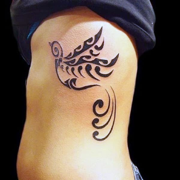 Tribal Tattoo at the side brings the captivating and lovely look