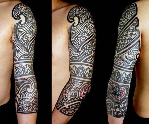 The Tribal tattoo on the upper left arm make a man look gallant