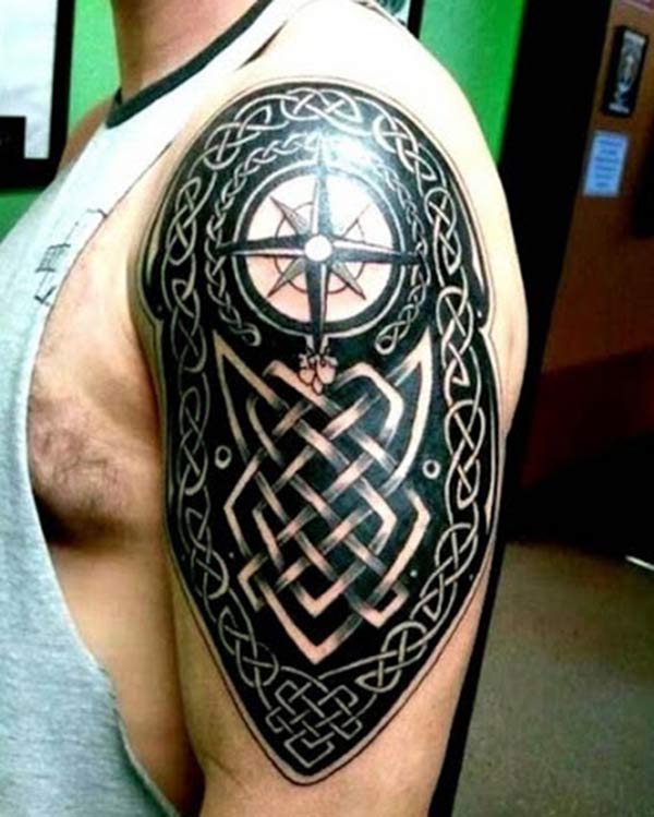 Tribal tattoo with a black ink design makes a man look stylish