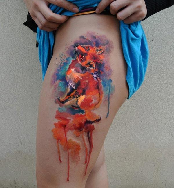 Scintillating glary fox watercolor thigh tattoo ideas for chic style girls