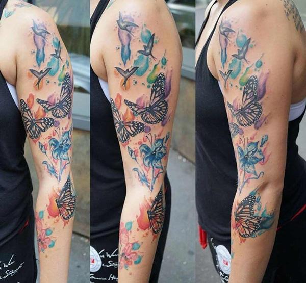 Flattering flying birds butterflies flowers tattoo for Girls and women on arm