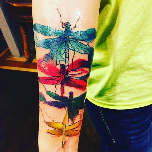 Stylish and vividly colored dragonflies Water color ink Arm tattoo ideas for adventurous boys and men