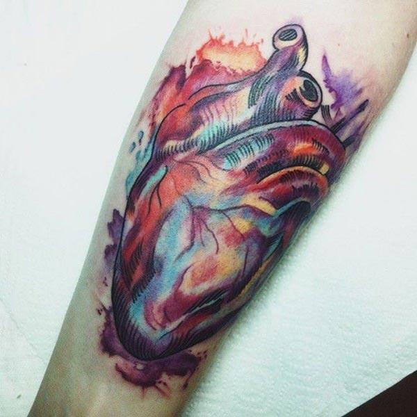 Stunning and vivacious heart Water color ink arm tattoo ideas for boys and men