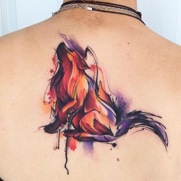 Breathtaking beautiful howling wolf watercolor back tattoo ideas for Girls