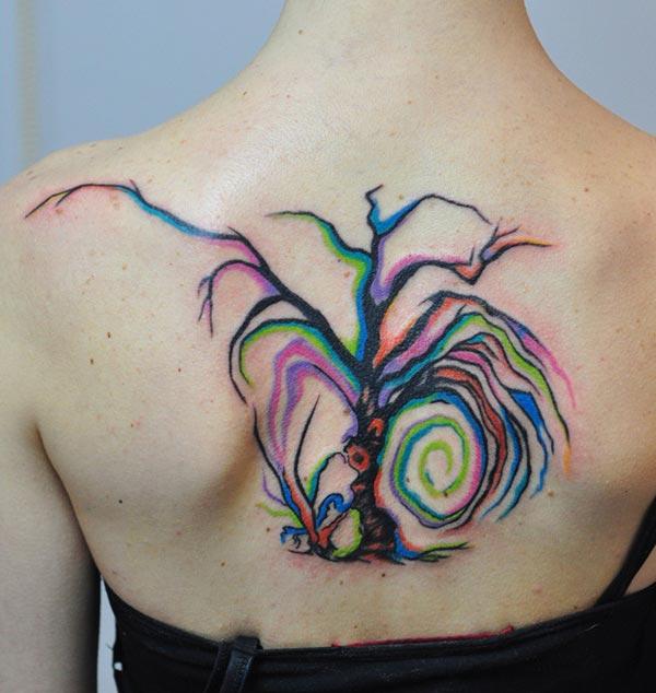 Colorful hypnotizing branch tree watercolor back tattoo for stylish Ladies