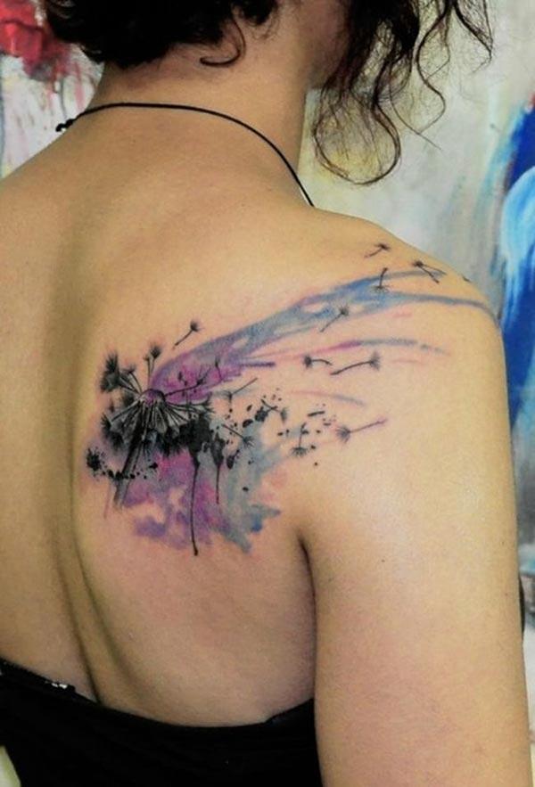 Impressive dandelion flower blown in wind ink splash tattoo ideas on back shoulder for Ladies