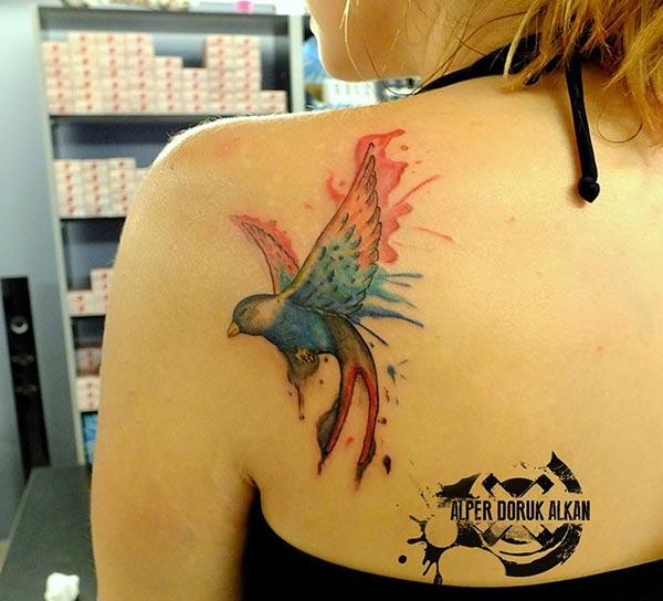 Splendid beautiful Flying bird watercolor back shoulder tattoo ideas for adventurous ladies