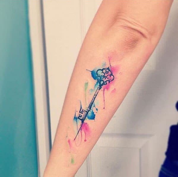 Winsome elegant skeleton key watercolor forearm tattoo for trendy women