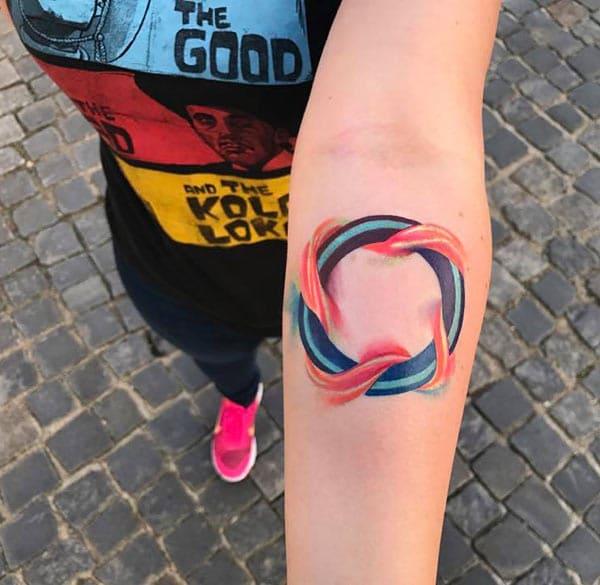 Attractive fiery hula hoop forearm watercolor tattoo designs for a la mode women