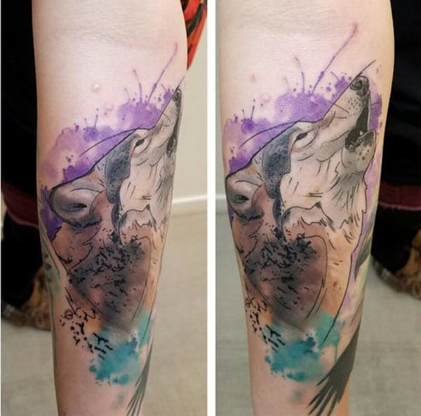 Women’s Beautiful watercolor tattoo ideas of howling wolf on forearm