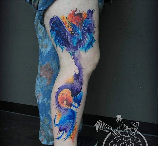 Ravishing Fire breathing dragon watercolor leg tattoo designs for Women
