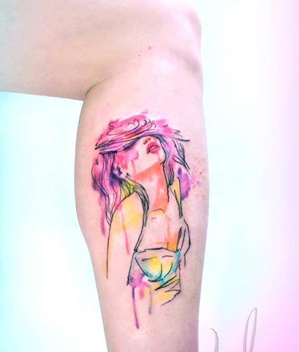 Vibrant stunning Woman watercolor tattoo on legs for women