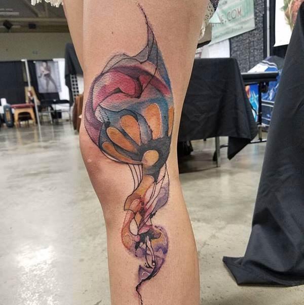 Attractive watercolor ink leg tattoo ideas for Girls