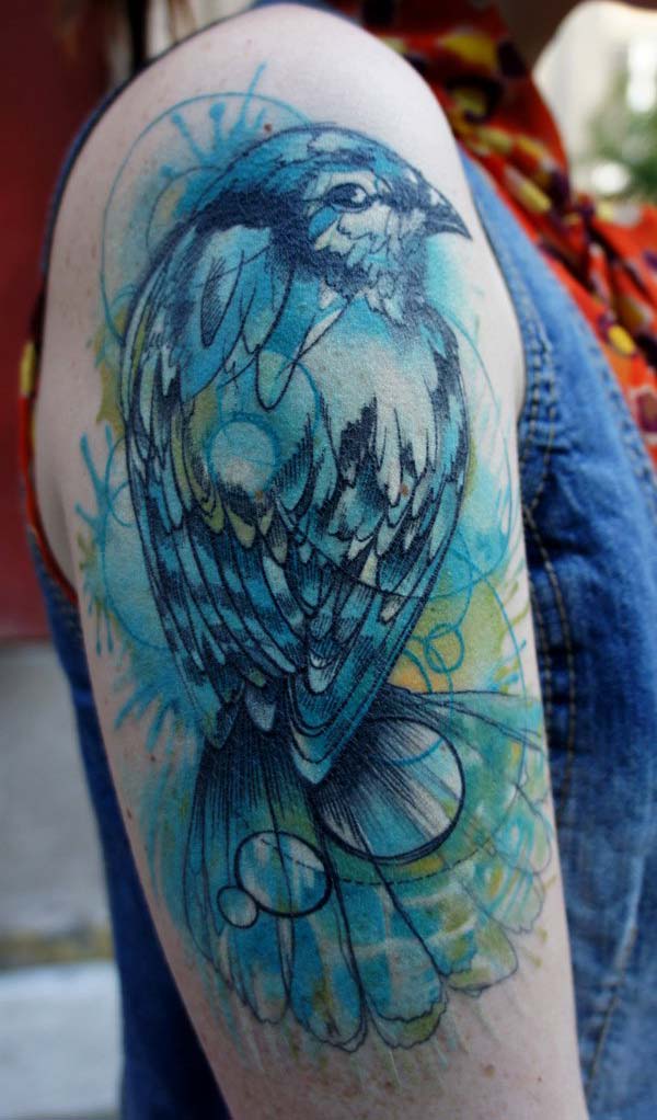 Captivating blue green bird watercolor tattoo design on shoulder for Ladies