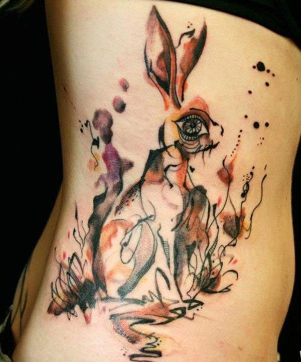 Fantastic big eyed rabbit watercolor side tattoo ideas for Females
