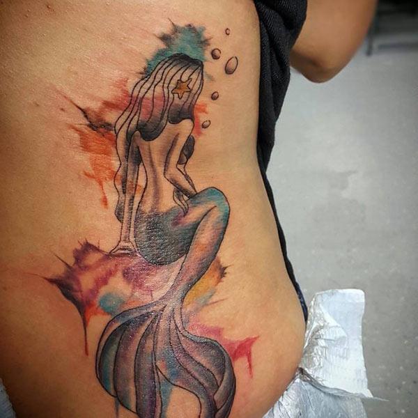 Bewitching mermaid watercolor side tattoo ideas for Girls