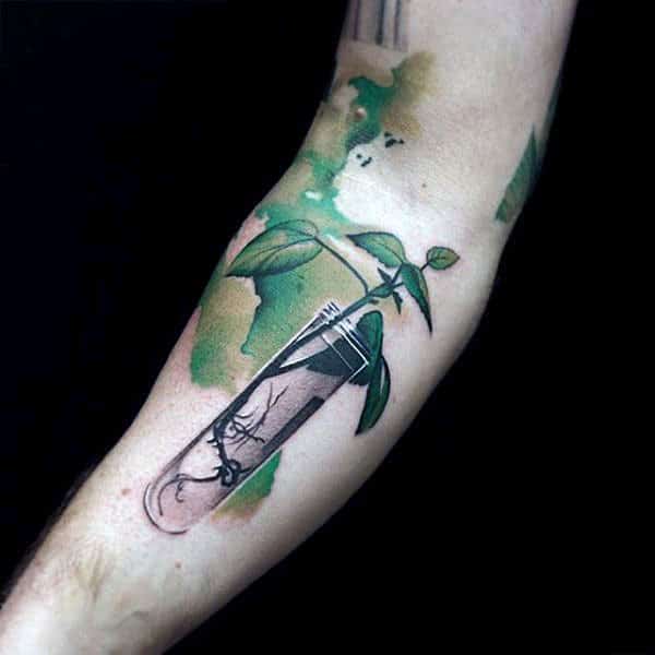 Growing plant in test tube design watercolor tattoo on sleeve for boys