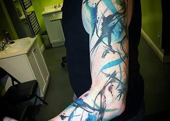 watercolor sleeve tattoos