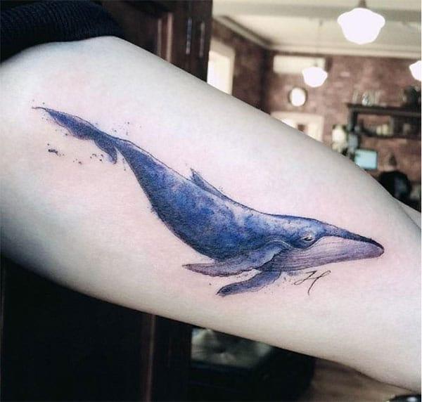 Ladies Majestic blue whale watercolor ink hand tattoo designs