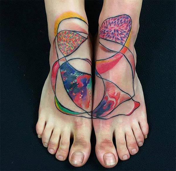 Attractive creative watercolor leg tattoo designs for Ladies