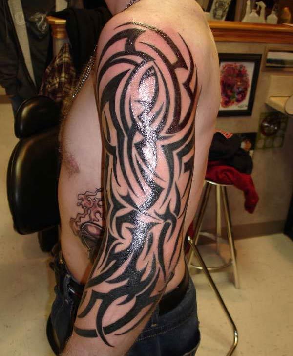Cool Celtic tribal tattoo designs on arm for Guys