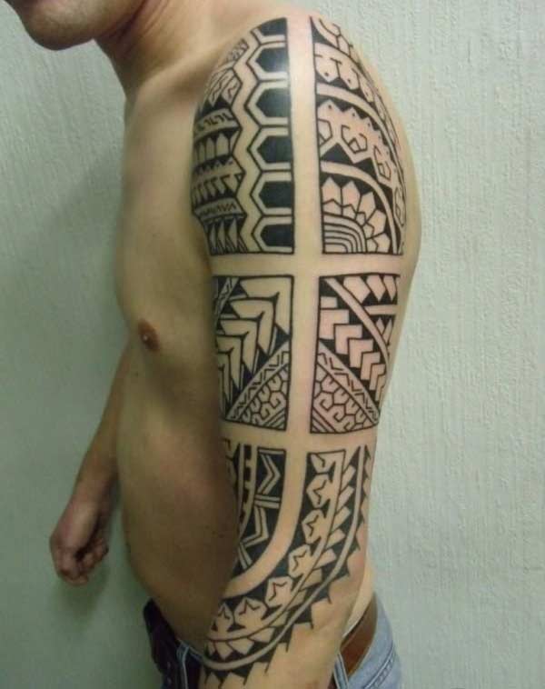Artistic Polynesian tribal tattoo designs on arm for Guys