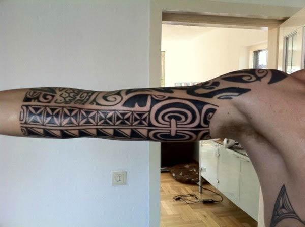 Solid bold Polynesian Tribal tattoo designs for Men on Arm