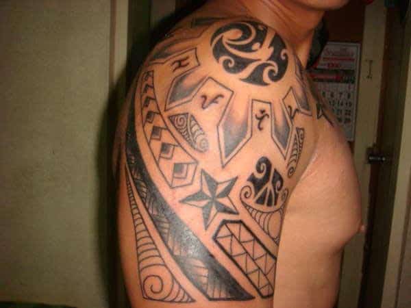 Simple lovely Filipino tribal tattoo designs on shoulder for Guys