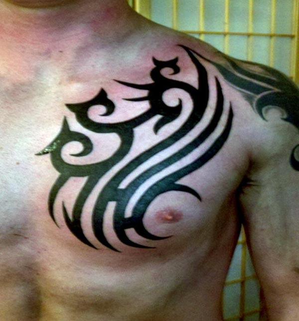 Intense black catchy tribal chest tattoo ideas for guys