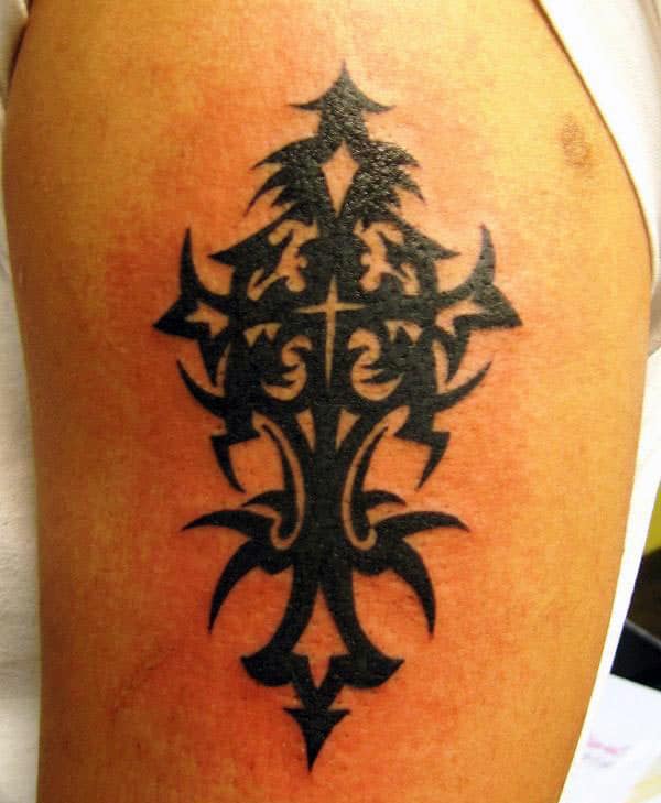 Cool intense black tribal cross tattoo designs for Guys on shoulder