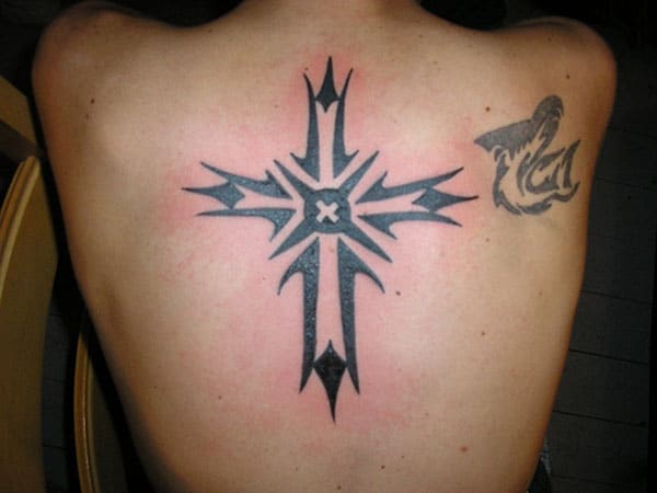 Attractive black tribal cross tattoo designs on back for Men