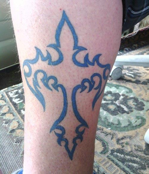 Fascinating blue lined tribal cross tattoo designs for Boys on Leg