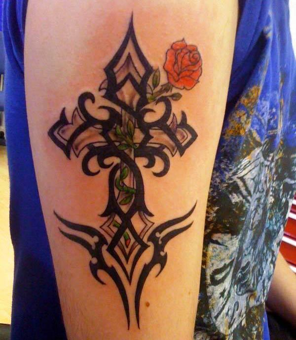 Fantastic cross with rose tribal tattoo ideas for Men on arm