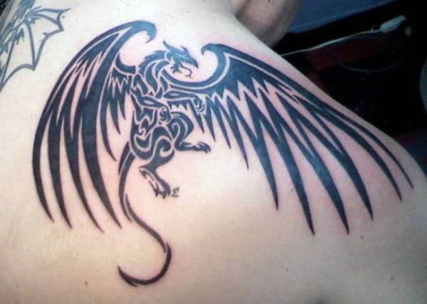 Arresting Flying dragon tribal tattoo ideas on back shoulder for Guys