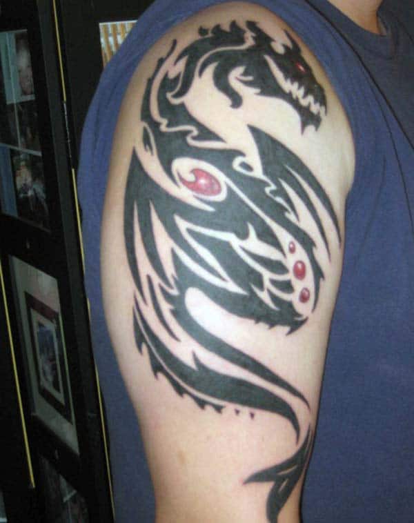 Magnificent black and red tribal dragon tattoo ideas on shoulder for Men