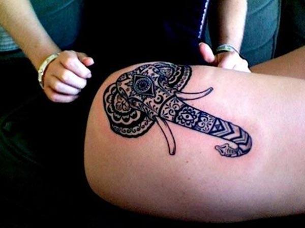 Majestic Aztec tribal elephant head tattoo ideas on thighs for Women
