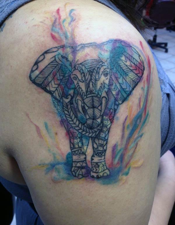 Vibrant detailed Polynesian tribal elephant tattoo ideas on shoulder for Girls and women