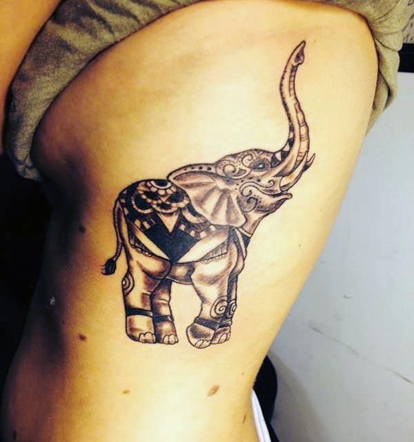 Decorative black and grey tribal elephant tattoo ideas on sides for fashionable Ladies