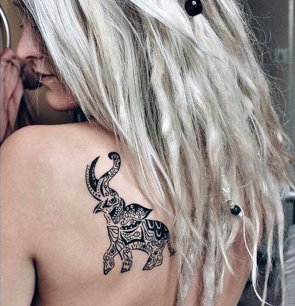 Mesmerizing trunk raised elephant tribal tattoo ideas on back shoulder for Girls