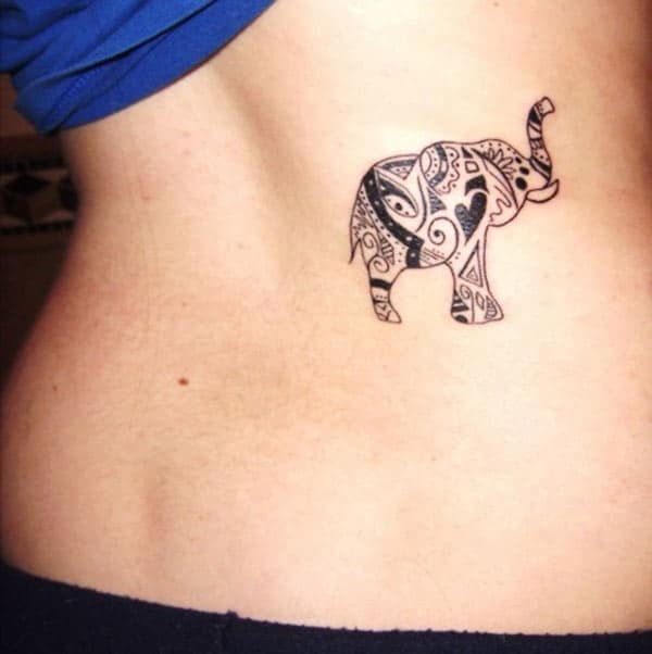 Adorable tiny tribal elephant tattoo ideas on lower back for Women