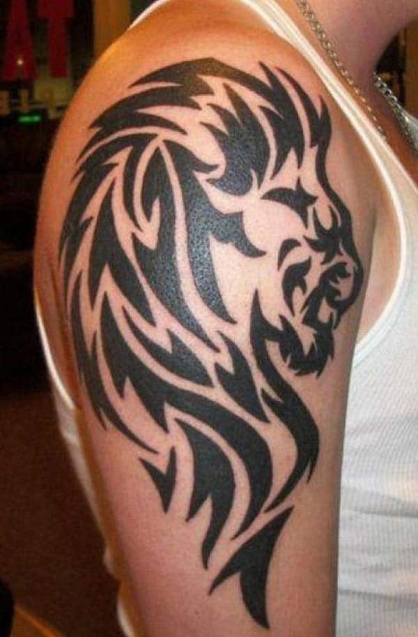Prideful looking black tribal lion tattoo designs on Shoulder for Masculine Guys