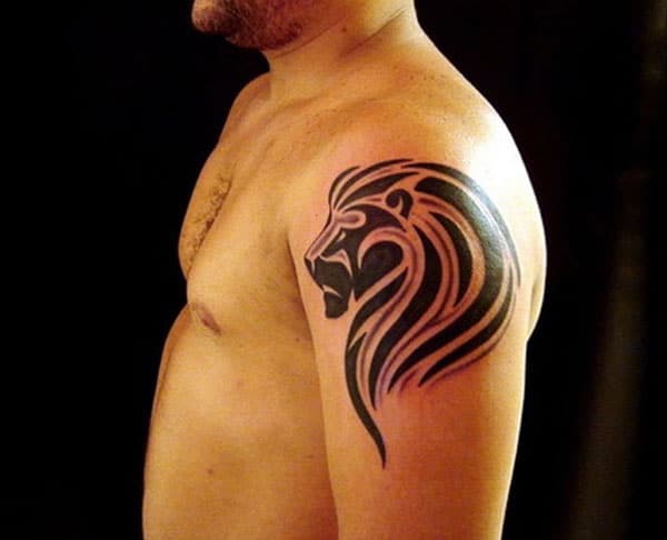 Catchy Purple black lion head tribal tattoo design on shoulder for Boys